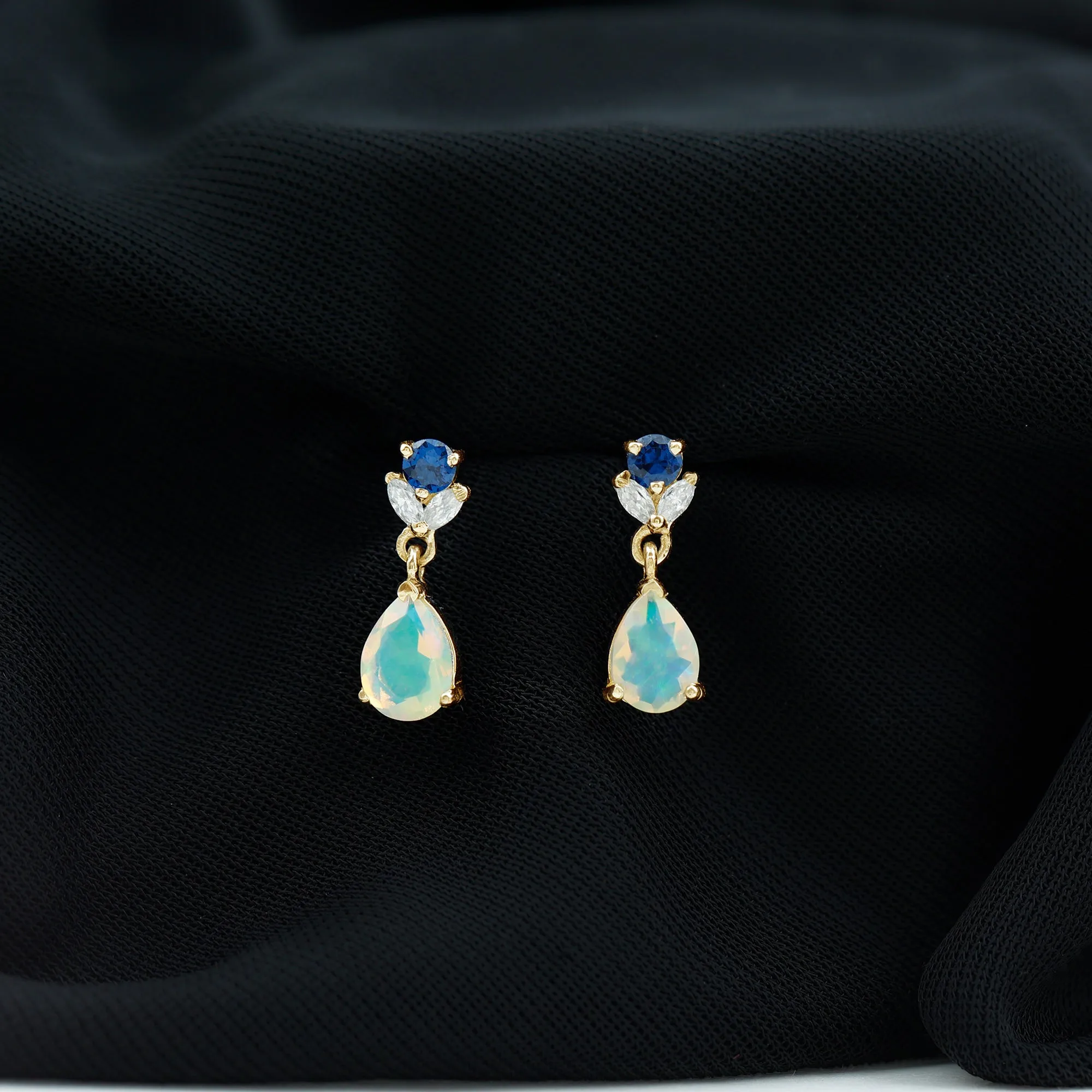 Ethiopian Opal and Created Blue Sapphire Dangle Earrings with Moissanite