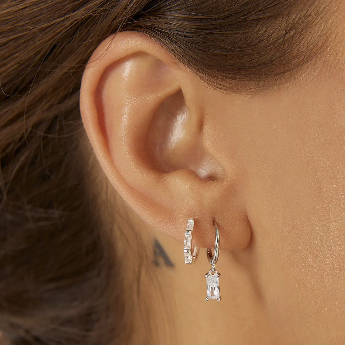 Holi Silver Huggie Earrings