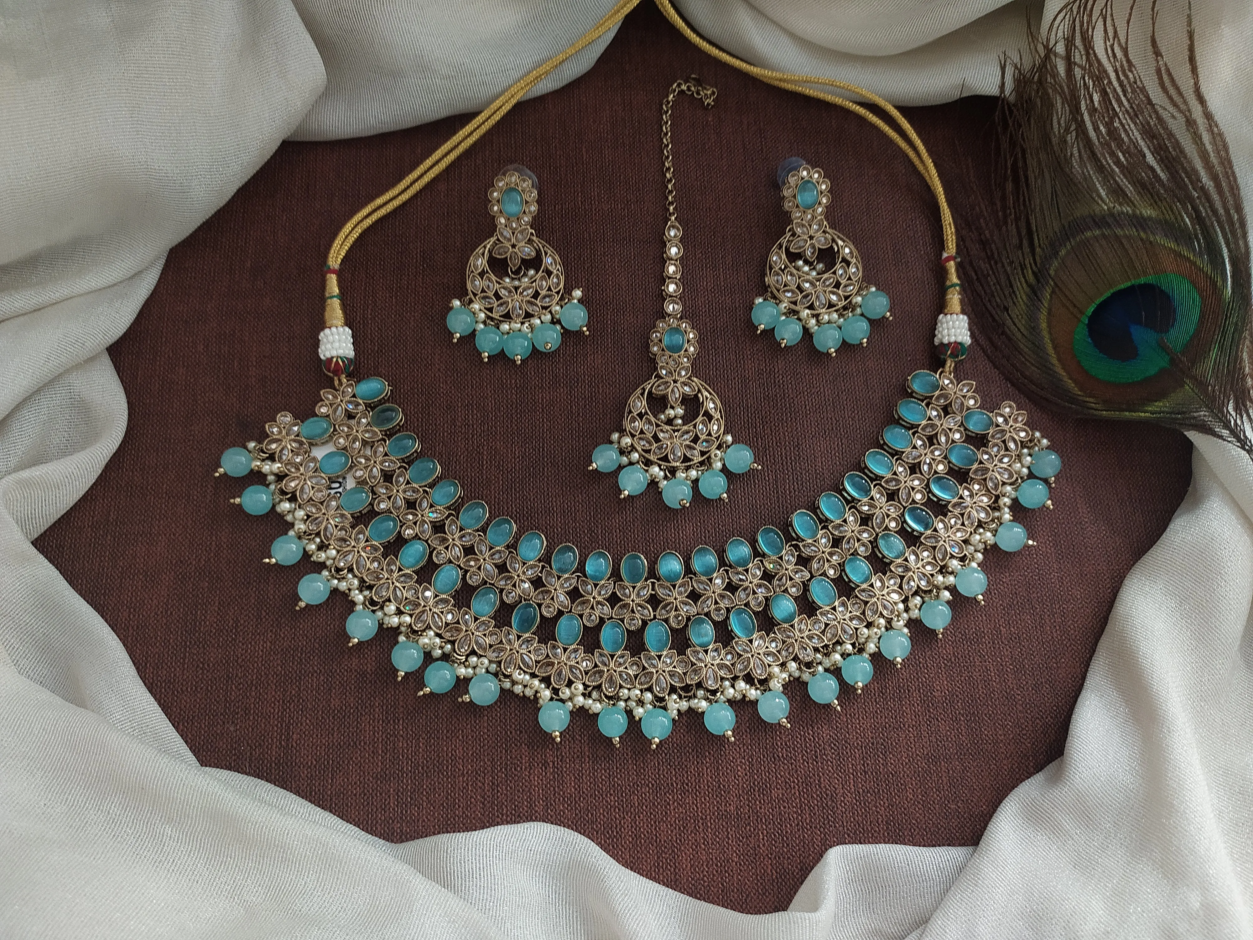 Radiate Regal Grandeur Uncut Polki Stones Mehandi Choker Set with Matching Accessories