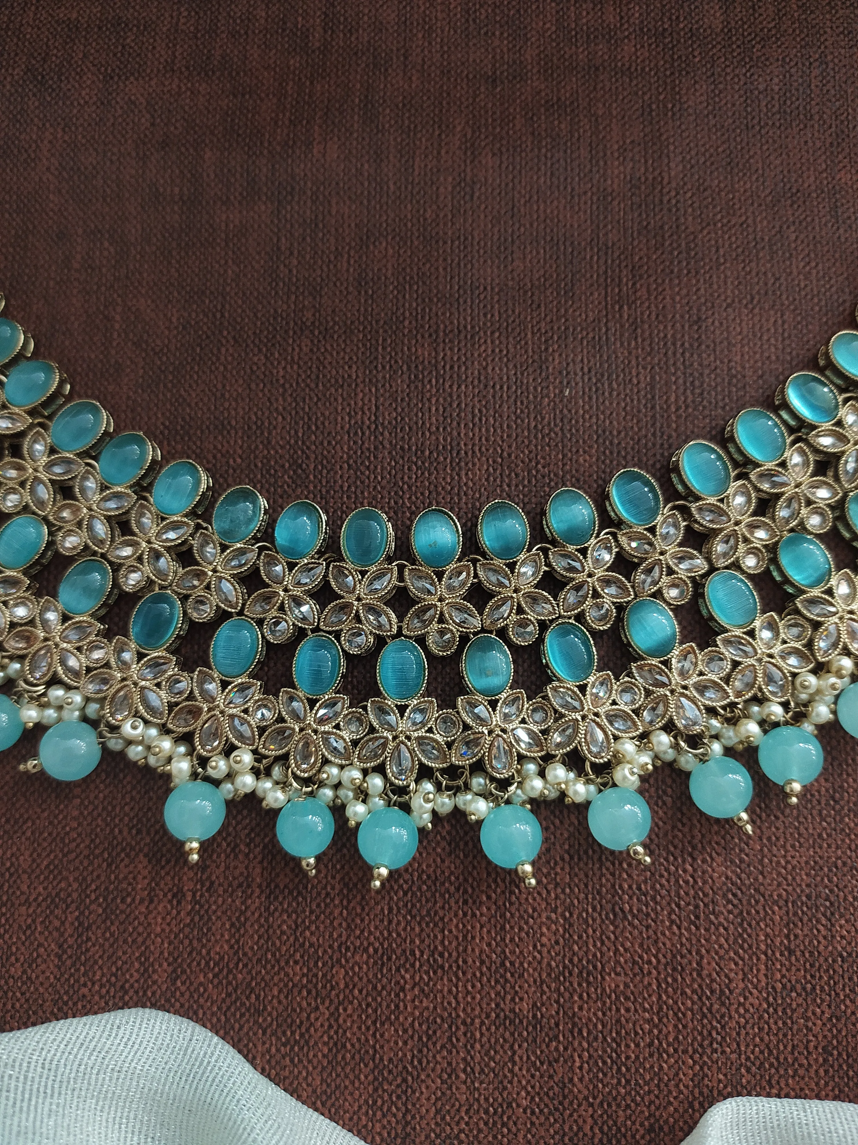Radiate Regal Grandeur Uncut Polki Stones Mehandi Choker Set with Matching Accessories