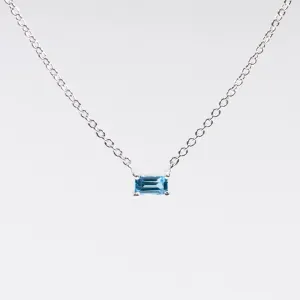 Silver Baguette Solitaire Blue Topaz Necklace